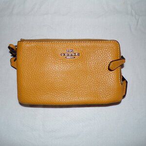 Coach wristlet, yellow